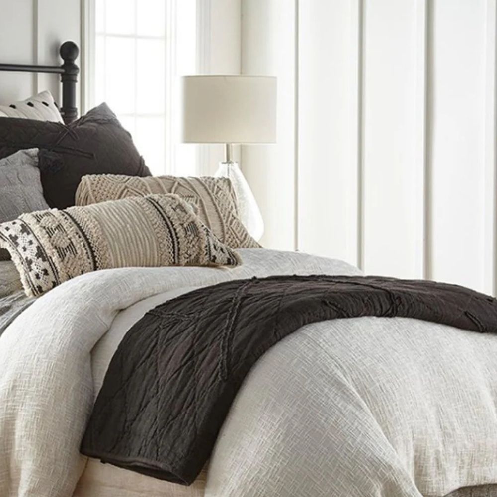 Bolster cushions cosy stylish on bed or sofa