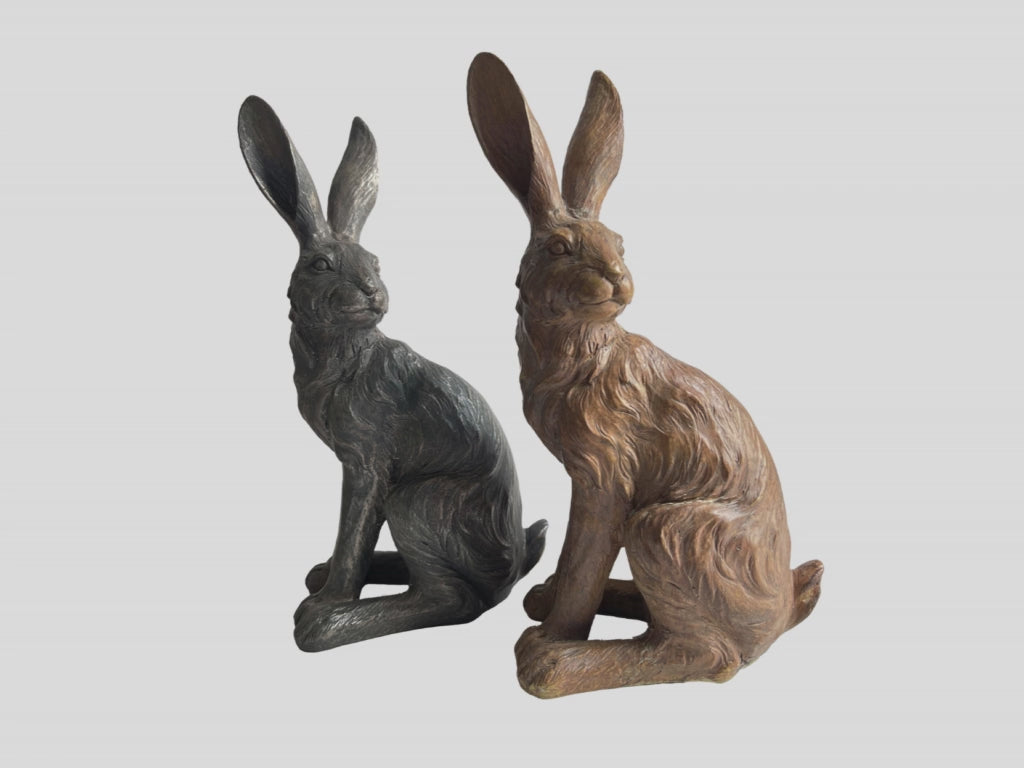 Load video: revolving images of grey and brown hare ornaments