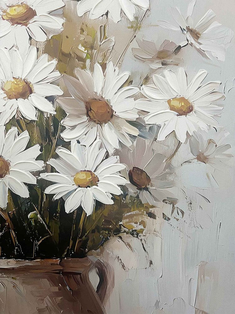 Close up of daisies in a vase on a textured white background
