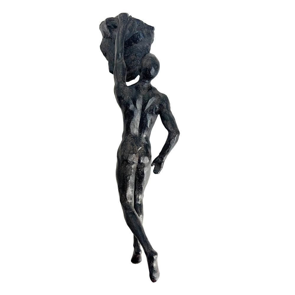 Aged sculpture hanging off a rock on a white background