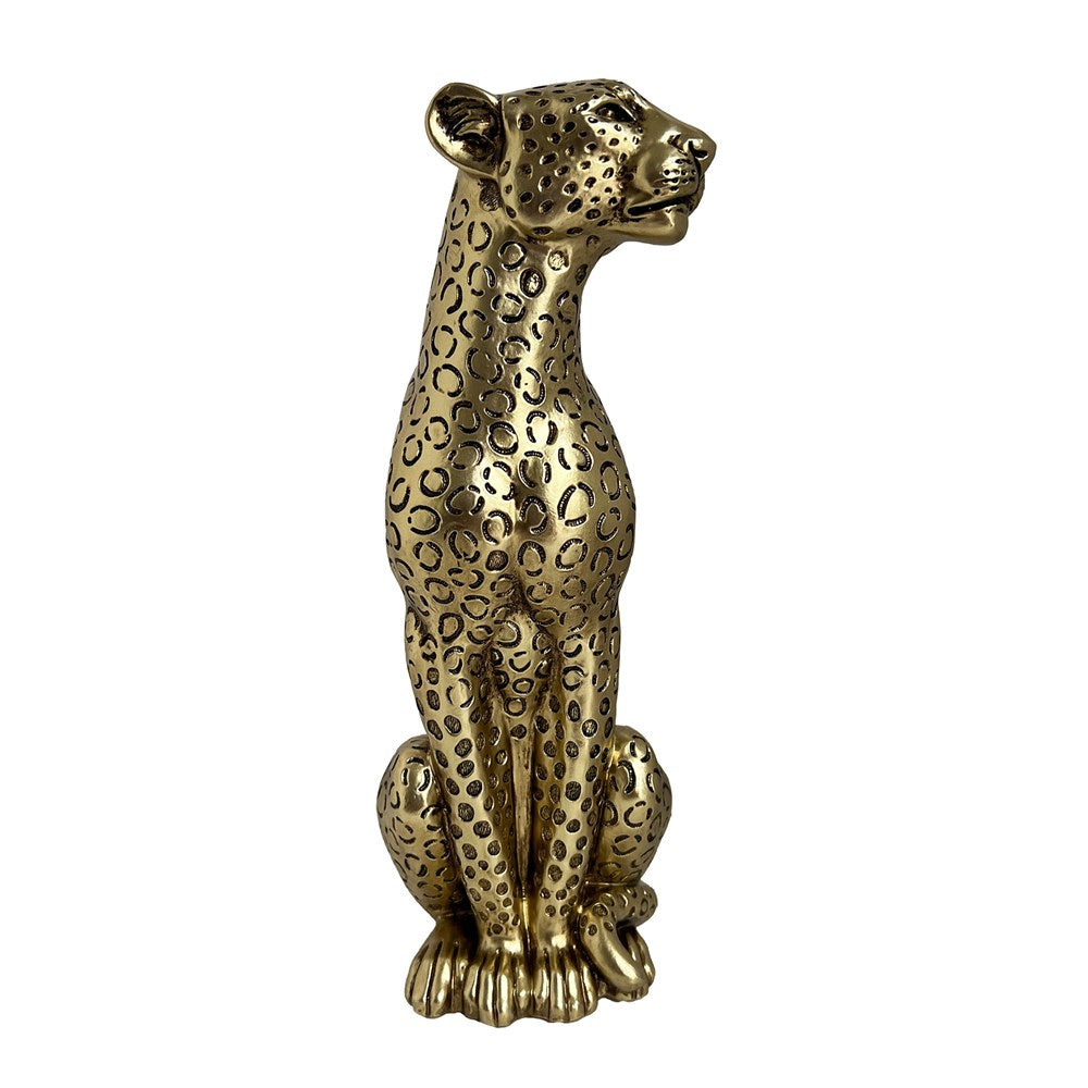 Gold statue of a leopard on a white background