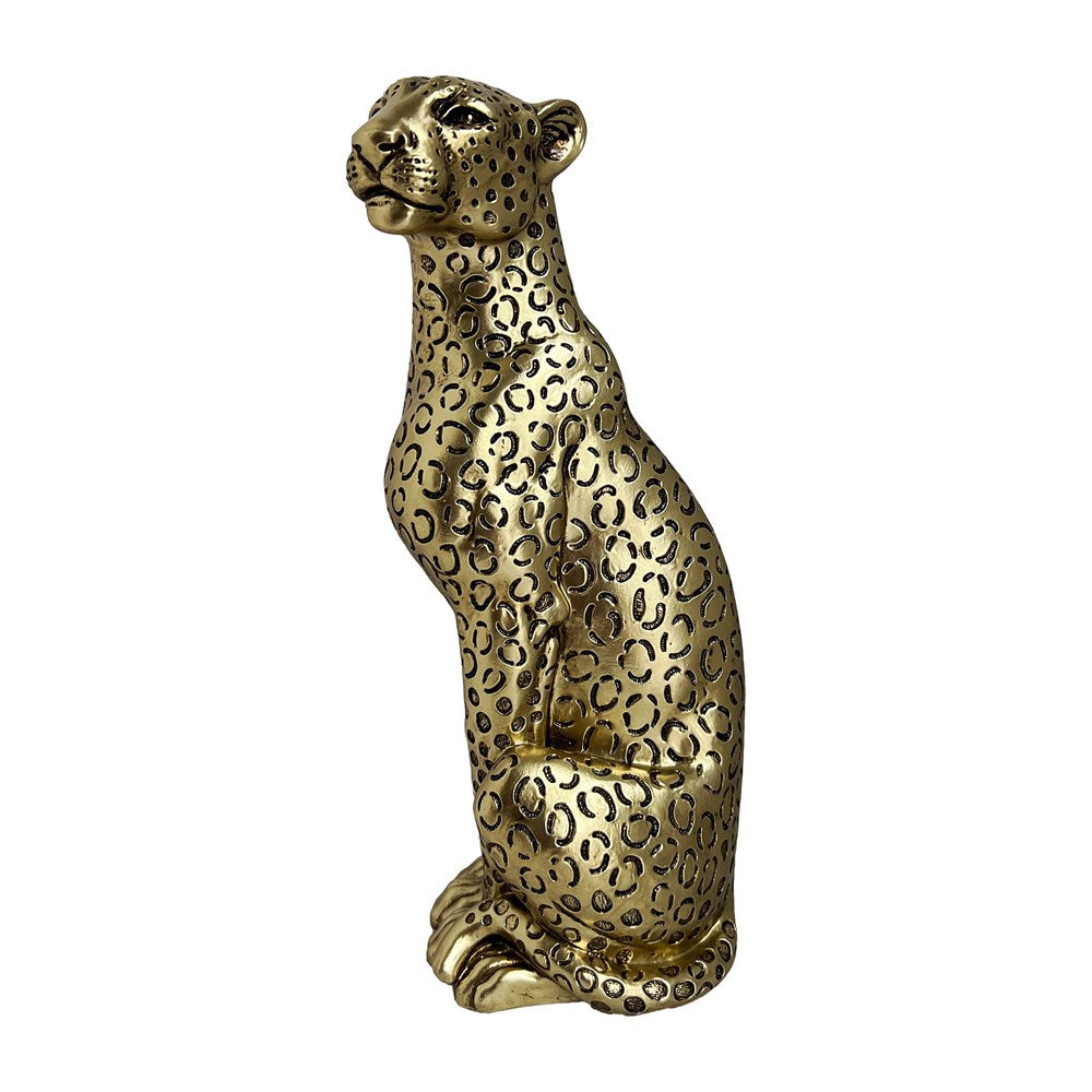 Gold leopard statue on a white background