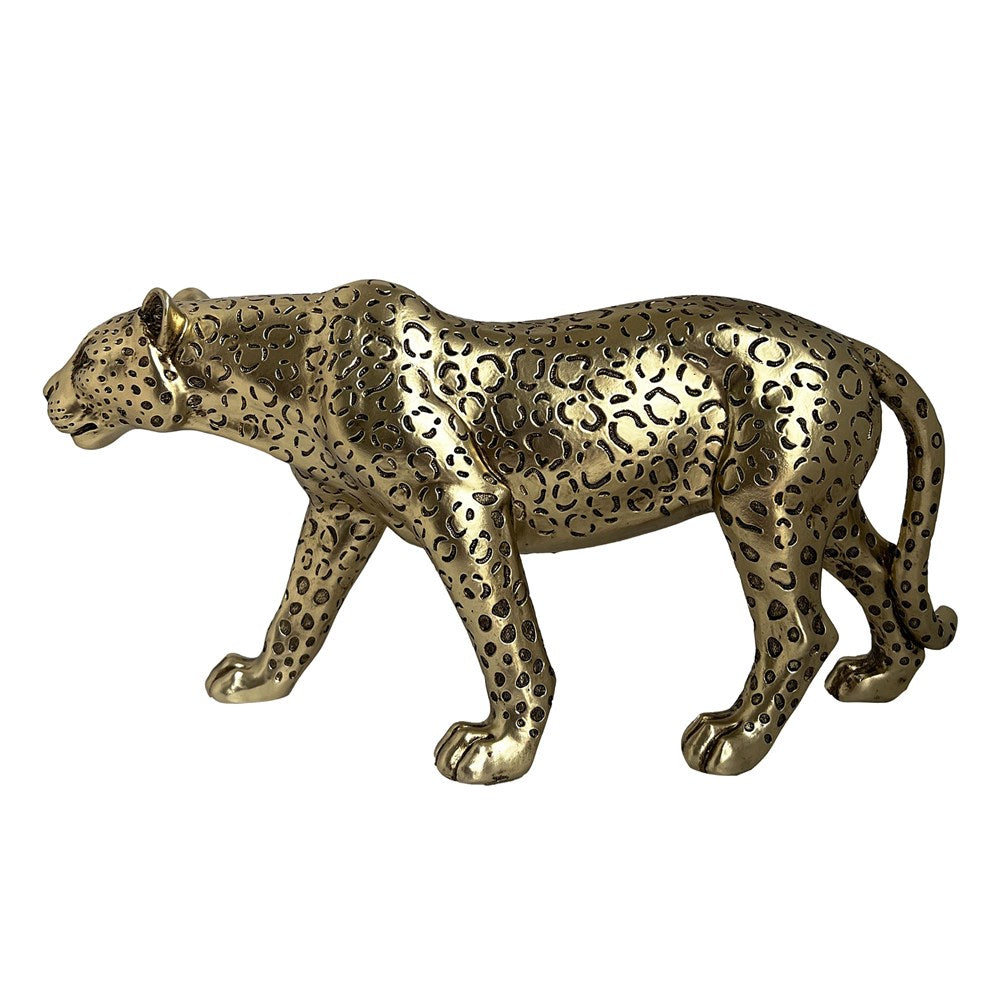 Gold leopard figurine on a white background