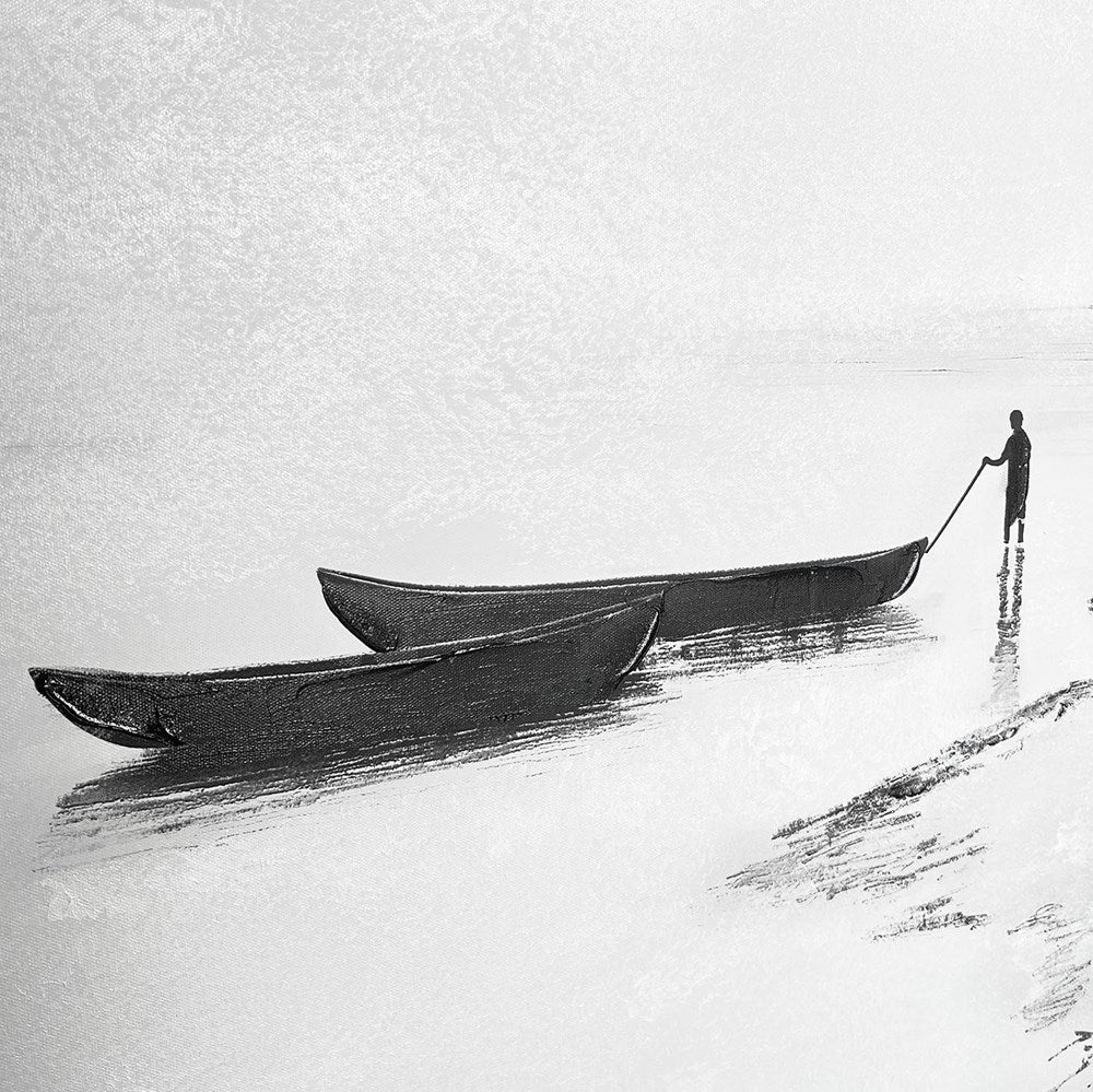 Two canoes on a water landscape with a person standing nearby.