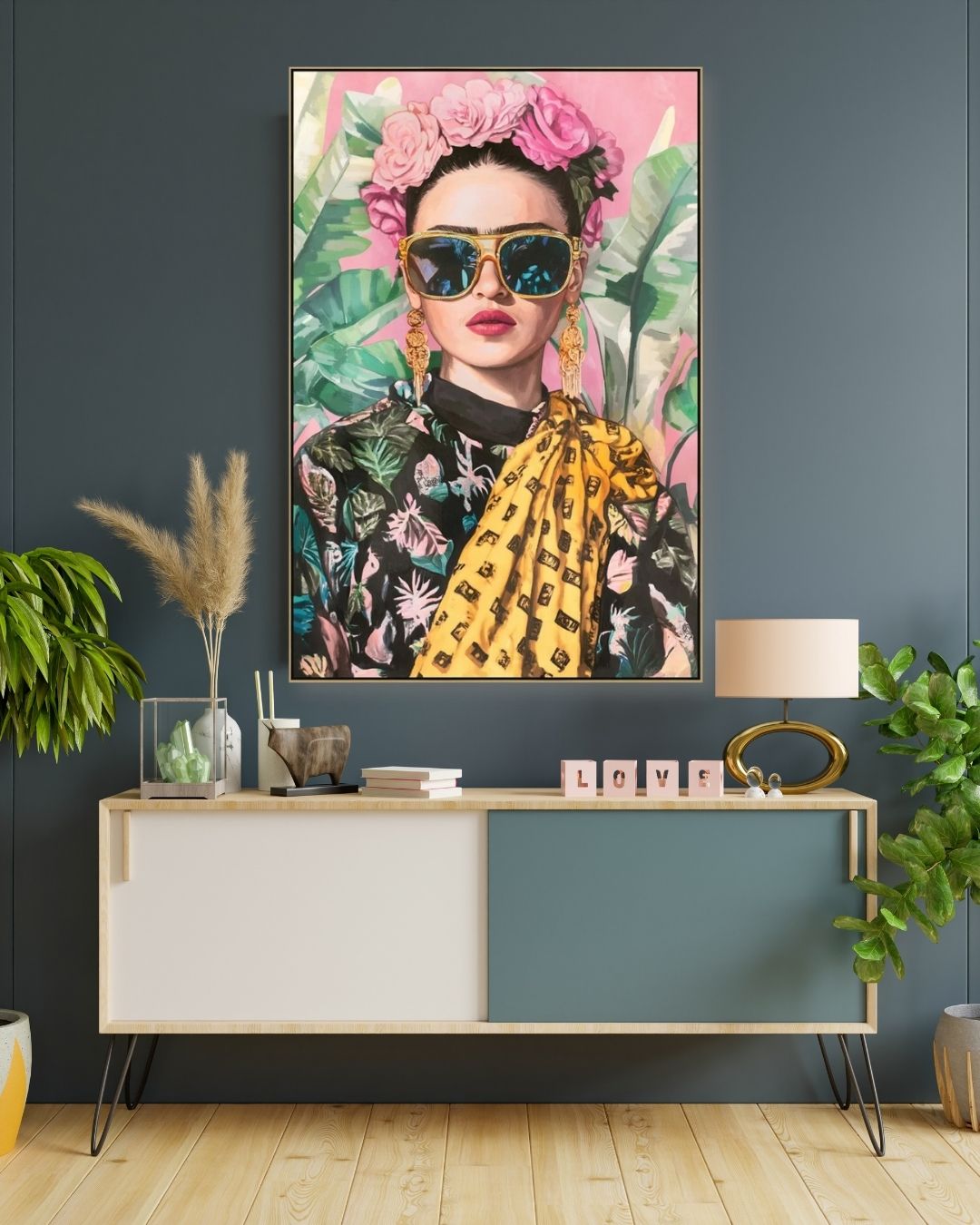 Portrait of Frida on a wall with a side table below canvas
