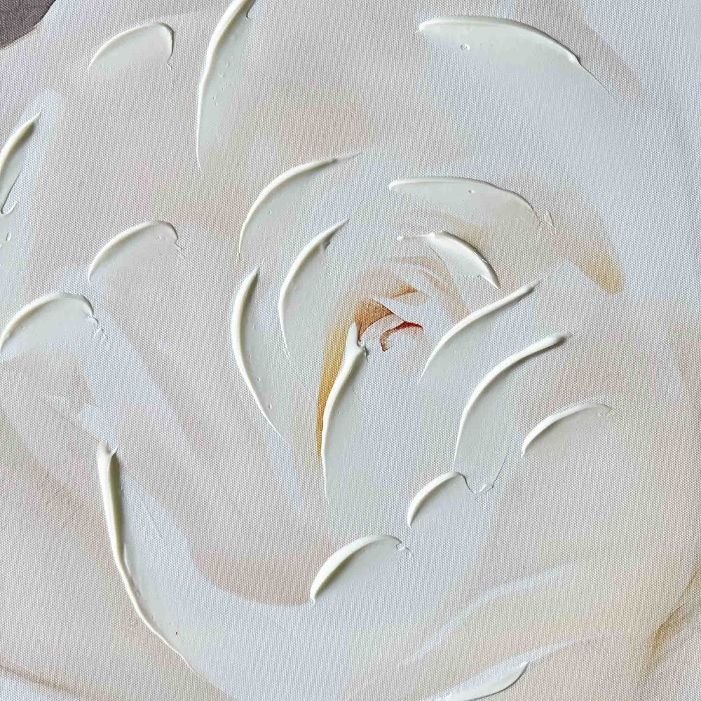 white and beige brush strokes on a textured beige background