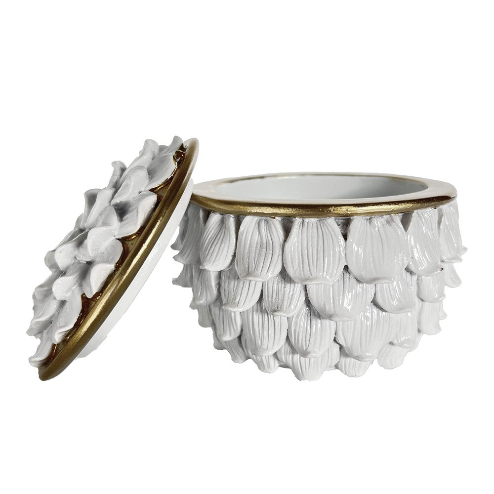 Decorative white trinket box with petal design and gold accents on a white background