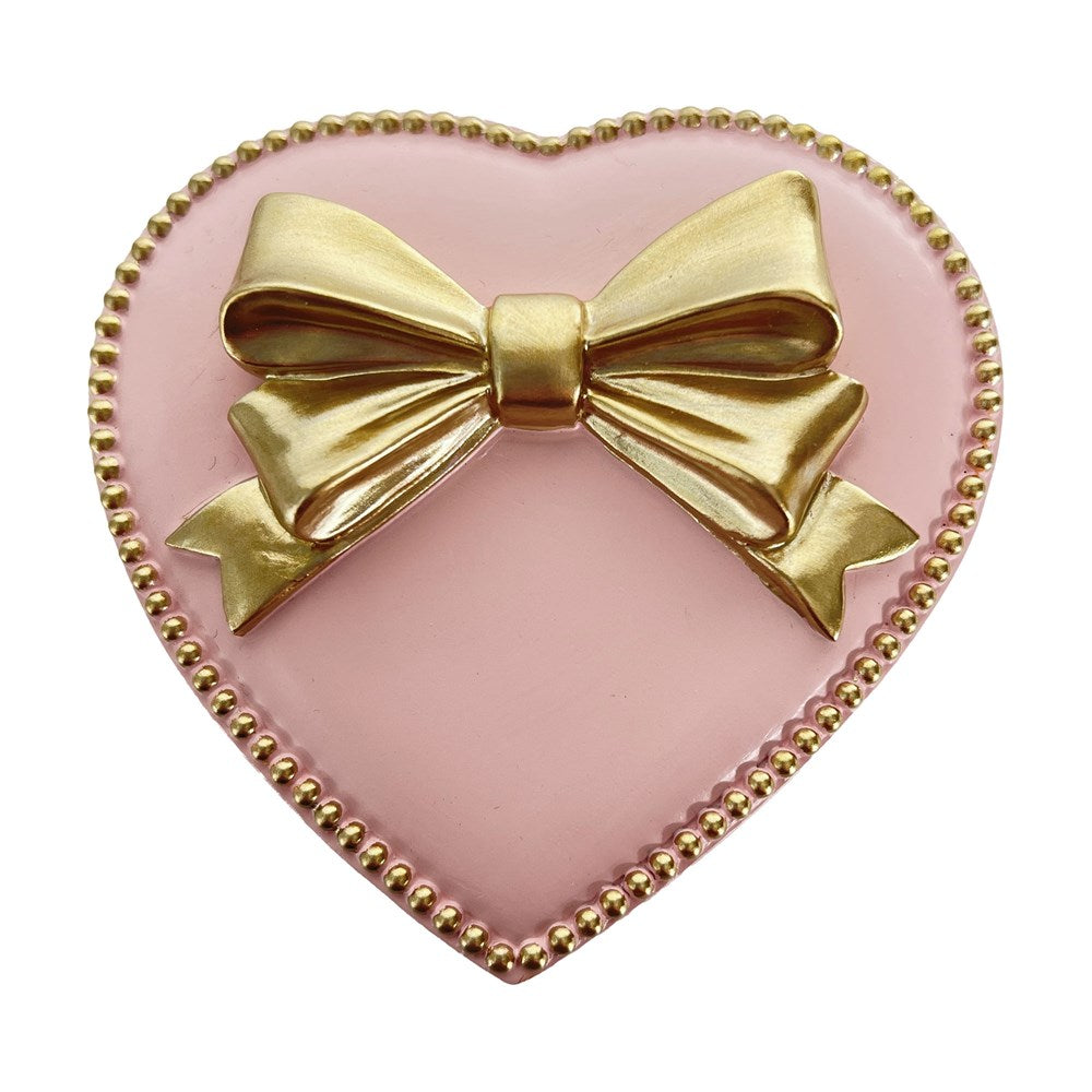 Heart-shaped lid with a gold bow 