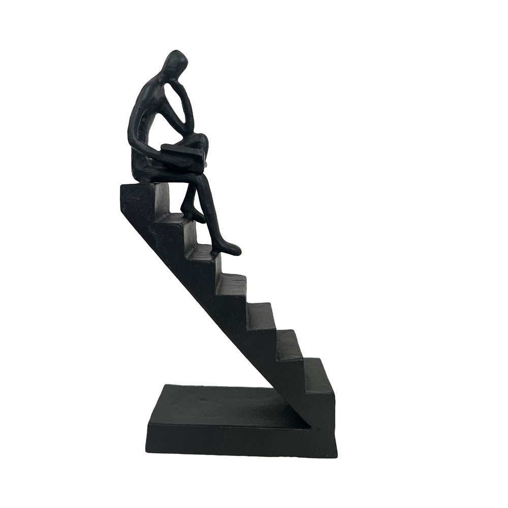 CAST IRON - GIRL READING ON STAIRS