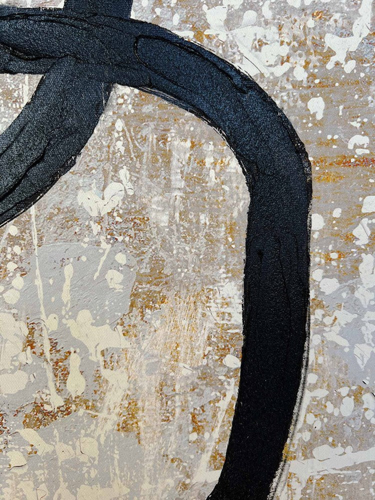 Close-up of a textured black on a patterned background