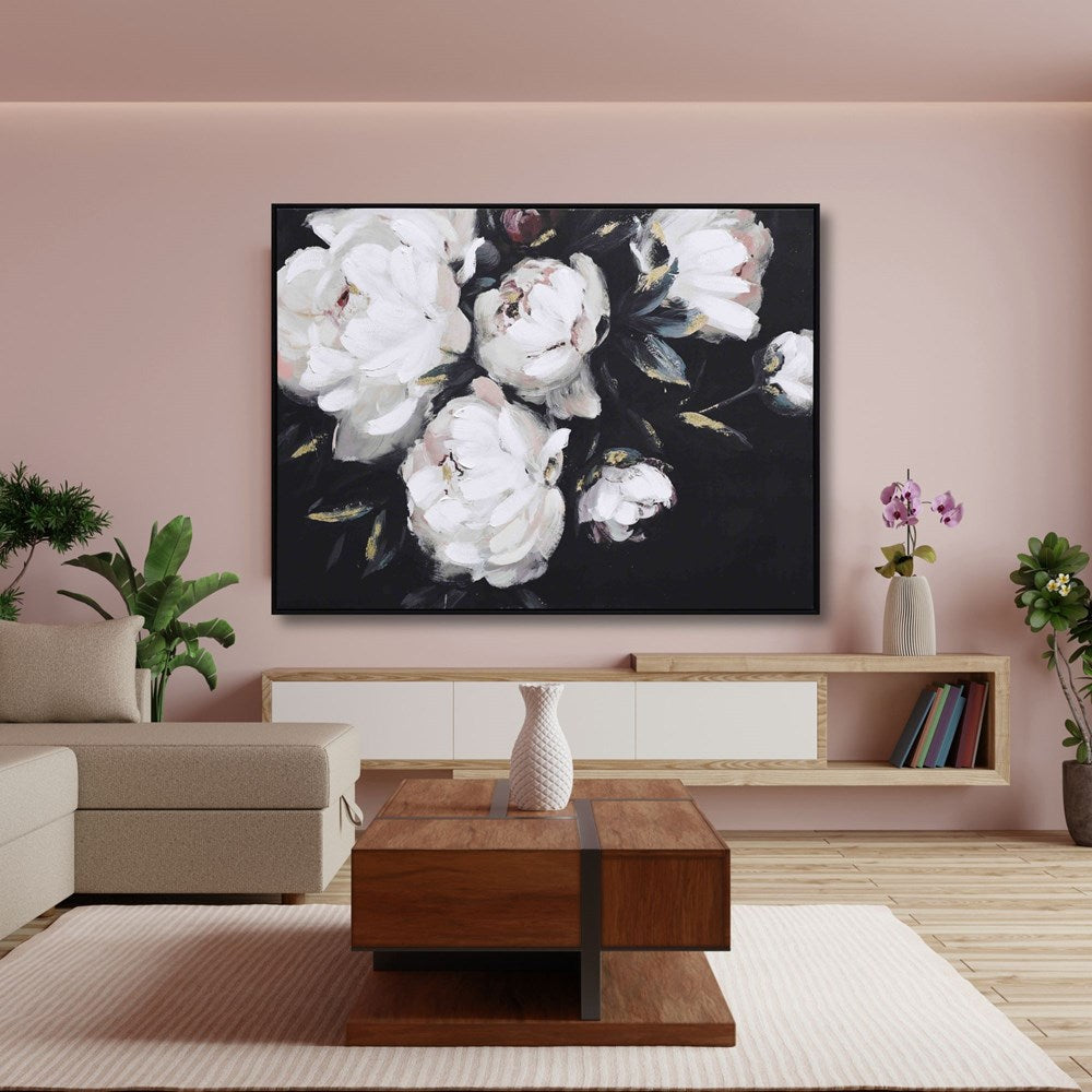 Living room with a large floral painting on the wall, wooden coffee table, and decorative elements.