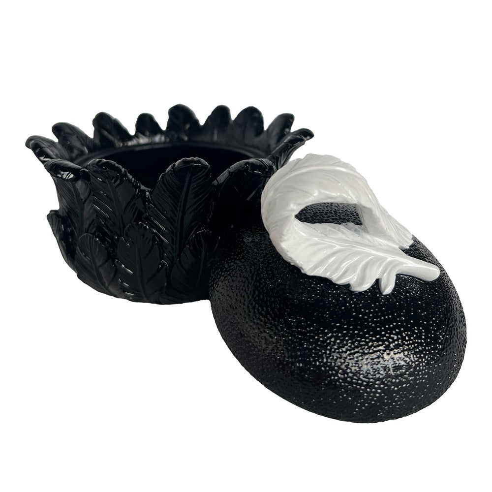 Black and white trinket box with a feather design on a white background