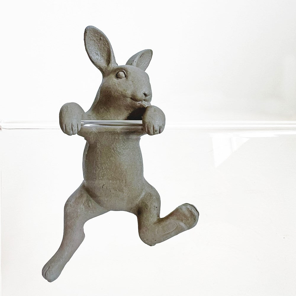 Decorative rabbit-shaped hook on a white background