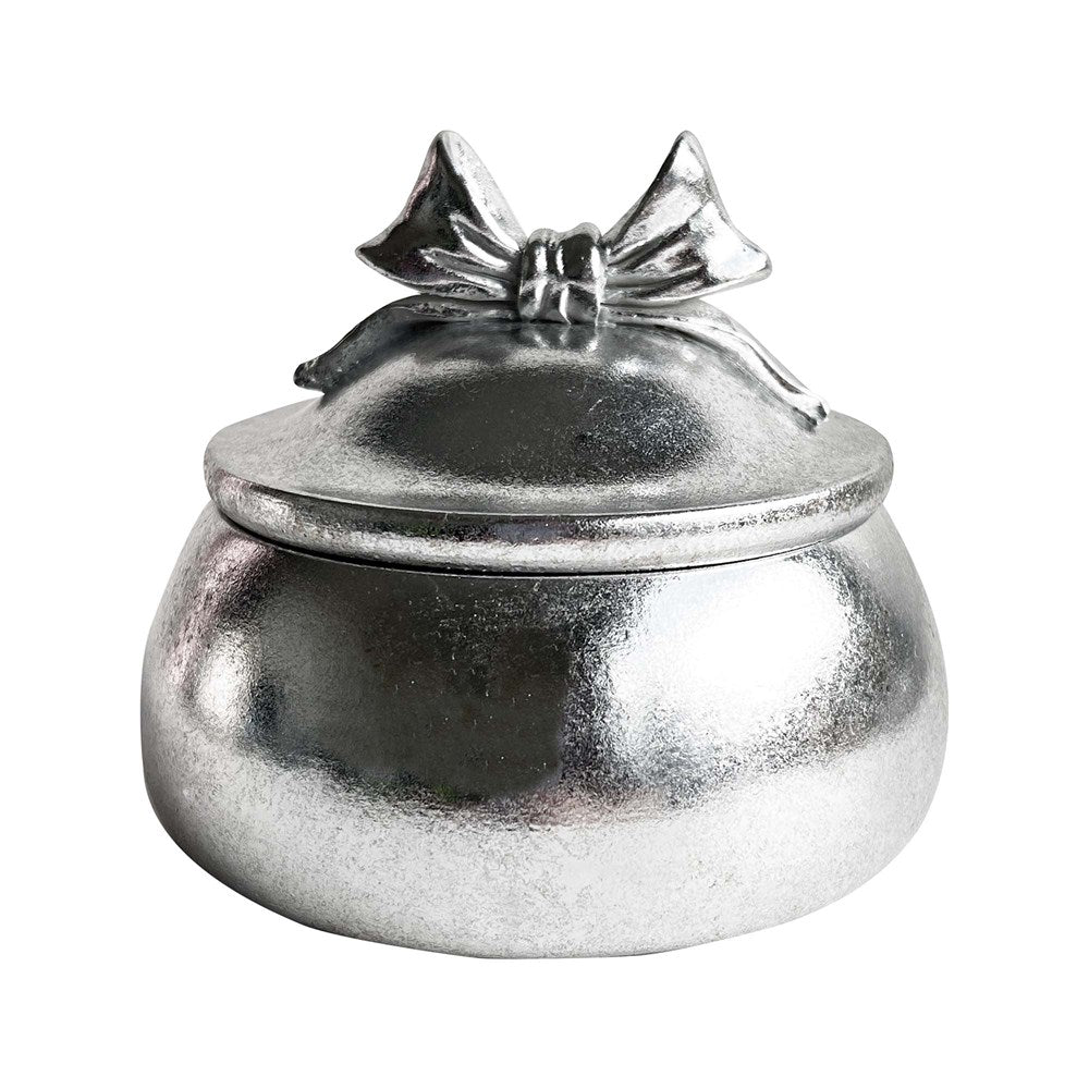 Silver trinket box with a bow on a white background
