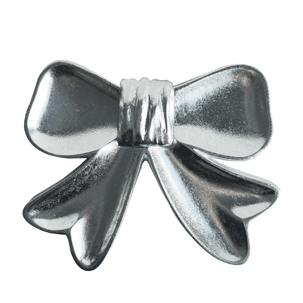 Silver bow-shaped dish on a white background