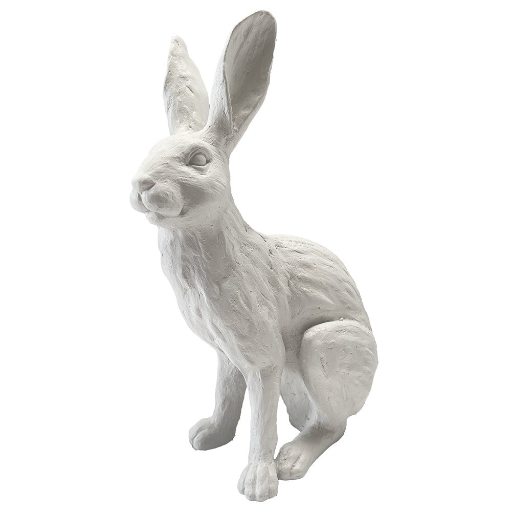 White rabbit statue on a white background